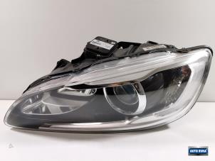 Gebruikte Koplamp links Volvo V60 I (FW/GW) 2.0 D2 16V Prijs € 374,95 Margeregeling aangeboden door Auto Rima Druten