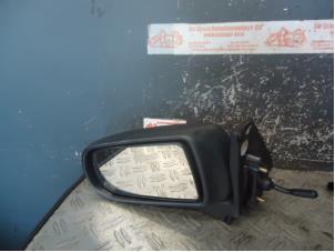 Gebruikte Buitenspiegel links Mazda 323 Fastbreak (BJ14) 1.5 LX,GLX 16V Prijs op aanvraag aangeboden door de Graaf autodemontage B.V.