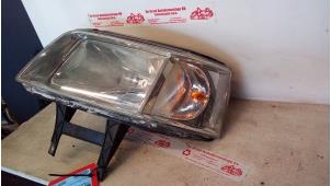 Gebruikte Koplamp links Volkswagen Transporter/Caravelle T5 2.5 TDi Prijs € 35,00 Margeregeling aangeboden door de Graaf autodemontage B.V.