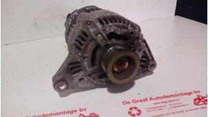 Gebruikte Dynamo Nissan Micra (K11) 1.3 LX,SLX 16V Prijs € 30,00 Margeregeling aangeboden door de Graaf autodemontage B.V.