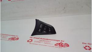 Gebruikte Radiobediening Stuur Opel Corsa E 1.4 16V Prijs € 25,00 Margeregeling aangeboden door de Graaf autodemontage B.V.