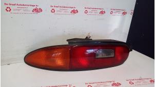Gebruikte Achterlicht links Mazda MX-3 1.8i V6 24V Prijs € 25,00 Margeregeling aangeboden door de Graaf autodemontage B.V.