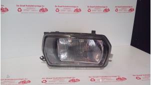 Gebruikte Koplamp links Audi 100 (C1) Prijs € 125,00 Margeregeling aangeboden door de Graaf autodemontage B.V.