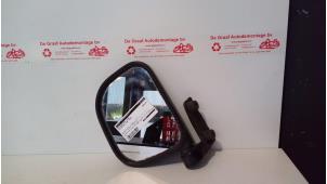 Gebruikte Buitenspiegel links Mitsubishi L-400 Prijs € 30,00 Margeregeling aangeboden door de Graaf autodemontage B.V.