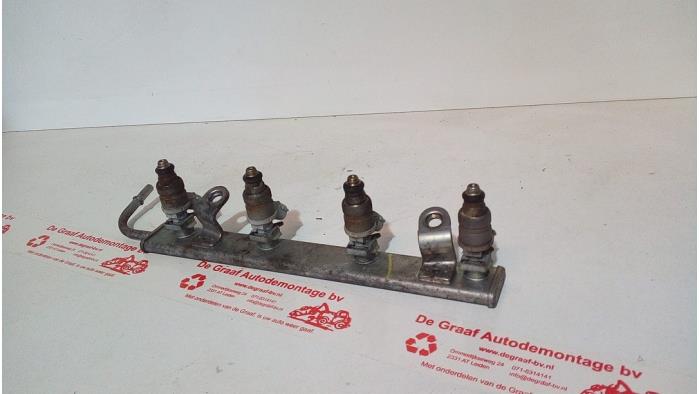 Gebruikte Injector brug Mitsubishi Colt (Z2/Z3) 1.5 16V CZ3 Prijs € 40,00 Margeregeling aangeboden door de Graaf autodemontage B.V.
