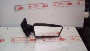 Nieuwe Spiegel Buiten rechts Citroen AX Prijs op aanvraag aangeboden door de Graaf autodemontage B.V.