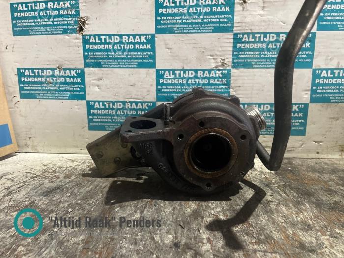 Turbo van een Volvo V70 (BW) 2.4 D5 20V 2008