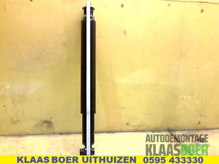 Schokdemper links-achter van een Opel Omega B (25/26/27) 2.2 16V 1999