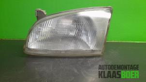 Gebruikte Koplamp links Toyota Starlet (EP9) 1.3,XLi,GLi 16V Prijs € 20,00 Margeregeling aangeboden door Autodemontage Klaas Boer
