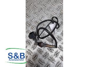 Lambda Sonde van een Volkswagen Golf III (1H1) 2.0 GTI 1995