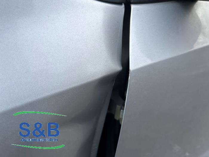 Portier 4Deurs links-voor van een Volkswagen Polo V (6R) 1.4 TDI DPF BlueMotion technology 2015
