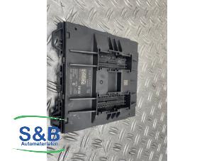 Computer boord van een Volkswagen Polo V (6R) 1.2 TDI 12V BlueMotion 2012