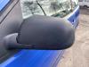 Buitenspiegel links van een Volkswagen Polo 2002