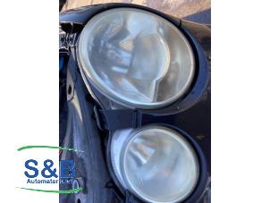 Gebruikte Linker Koplamp Volkswagen Polo IV (9N1/2/3) 1.4 16V 75 Prijs € 25,00 Margeregeling aangeboden door Schaap & Bron
