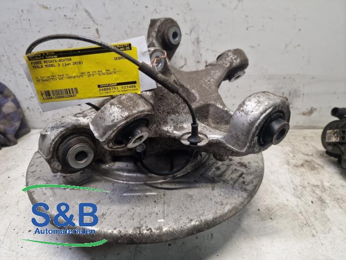 Fusee rechts-achter van een Tesla Model 3 Long Range AWD 75 kWh 2019