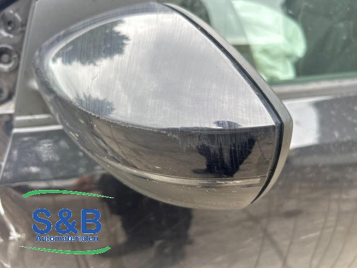 Buitenspiegel links van een Volkswagen Polo V (6R) 1.4 TDI DPF BlueMotion technology 2014