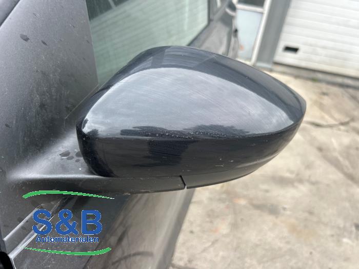 Buitenspiegel links van een Volkswagen Polo V (6R) 1.4 TDI DPF BlueMotion technology 2014