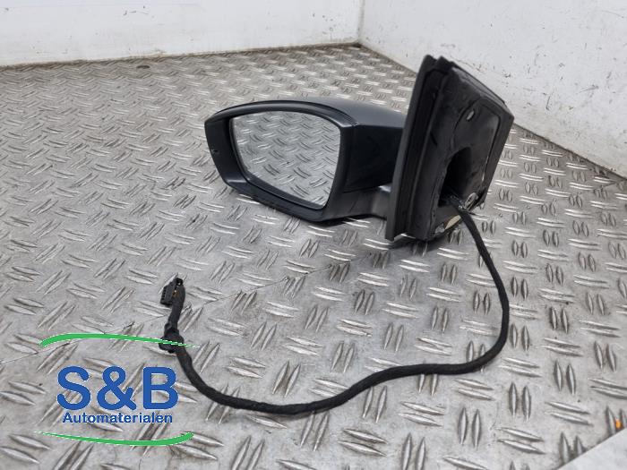 Buitenspiegel links van een Volkswagen Polo V (6R) 1.4 TDI 12V 90 2016
