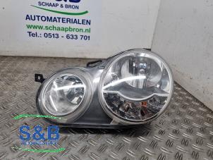 Gebruikte Linker Koplamp Volkswagen Polo IV (9N1/2/3) 1.4 16V Prijs € 40,00 Margeregeling aangeboden door Schaap & Bron