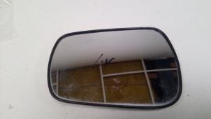 Gebruikte Spiegelglas links Ford Fiesta 5 (JD/JH) 1.3 Prijs € 10,00 Margeregeling aangeboden door F. van den Mosselaar autodemontage