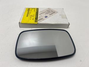 Gebruikte Spiegelglas rechts Ford Fiesta 3 Prijs € 7,50 Margeregeling aangeboden door F. van den Mosselaar autodemontage