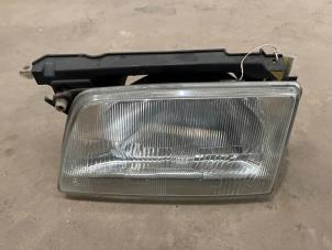 Gebruikte Koplamp links Opel Kadett E (33/34/43/44) 1.4 i L,LS,GL Prijs € 20,00 Margeregeling aangeboden door F. van den Mosselaar autodemontage