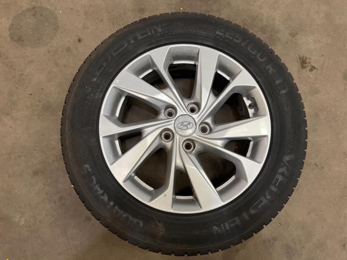 Velgen set + banden van een Hyundai Tucson (TL) 2.0 CRDi 16V High Power 4WD 2019