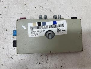 Gebruikte Antenne Versterker BMW 3 serie (E93) 320i 16V Prijs € 25,00 Margeregeling aangeboden door F. van den Mosselaar autodemontage