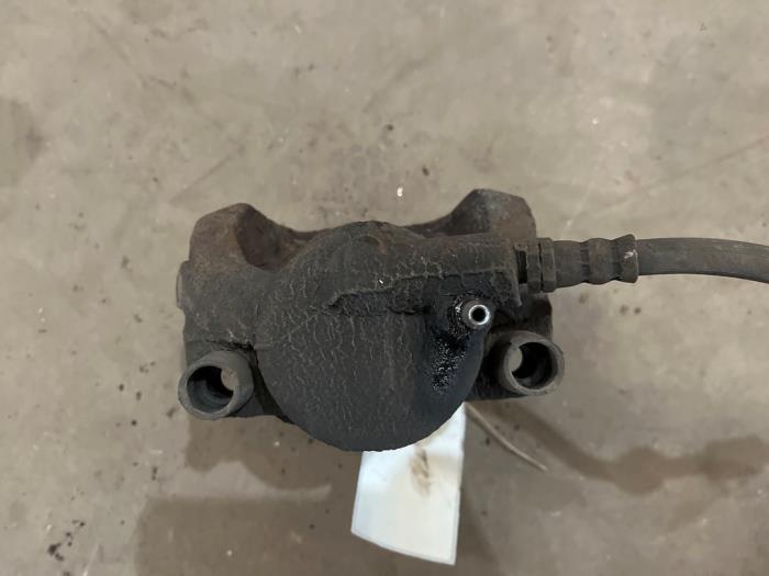 Remklauw (Tang) rechts-voor van een Ford Mondeo IV Wagon 2.0 TDCi 130 16V 2008