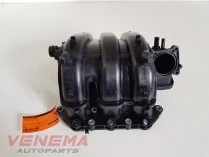 Gebruikte Inlaatspruitstuk Volkswagen Polo V (6R) 1.2 12V BlueMotion Technology Prijs € 39,99 Margeregeling aangeboden door Venema Autoparts