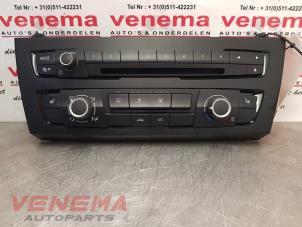 Gebruikte Climatronic Paneel BMW 1 serie (F20) 116i 1.6 16V Prijs € 289,99 Margeregeling aangeboden door Venema Autoparts