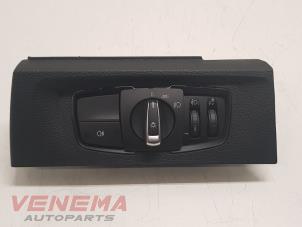 Gebruikte Schakelaar Licht BMW 1 serie (F21) 114i 1.6 16V Prijs € 34,99 Margeregeling aangeboden door Venema Autoparts