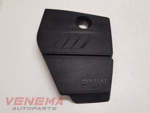 Gebruikte Motor Beschermplaat BMW 1 serie (F21) 114i 1.6 16V Prijs € 34,99 Margeregeling aangeboden door Venema Autoparts