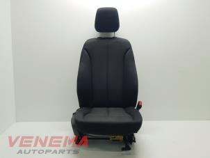 Gebruikte Voorstoel rechts BMW 1 serie (F20) 116i 1.6 16V Prijs € 199,99 Margeregeling aangeboden door Venema Autoparts