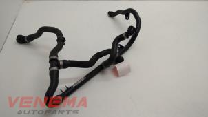 Gebruikte Koelwaterslang BMW X1 (E84) xDrive 20i 2.0 16V Twin Power Turbo Prijs € 34,99 Margeregeling aangeboden door Venema Autoparts