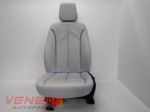Gebruikte Voorstoel links BMW 1 serie (F20) 116i 1.6 16V Prijs € 199,99 Margeregeling aangeboden door Venema Autoparts