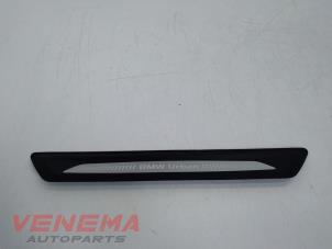 Gebruikte Sierstrip BMW 1 serie (F20) 116i 1.6 16V Prijs € 14,99 Margeregeling aangeboden door Venema Autoparts