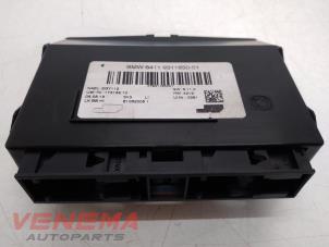 Gebruikte Computer Kachel BMW 1 serie (F20) 120i 1.6 16V Prijs € 24,99 Margeregeling aangeboden door Venema Autoparts