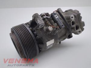 Gebruikte Pomp Airco BMW 1 serie (E81) 116i 1.6 16V Prijs € 39,99 Margeregeling aangeboden door Venema Autoparts