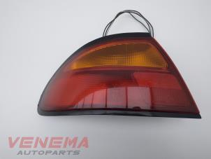 Gebruikte Achterlicht links Mazda 323 F (BA14) 1.8i GLX,GT 16V Prijs € 24,99 Margeregeling aangeboden door Venema Autoparts