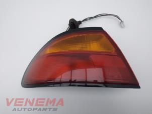Gebruikte Achterlicht links Mazda 323 F (BA14) 1.8i GLX,GT 16V Prijs € 24,99 Margeregeling aangeboden door Venema Autoparts