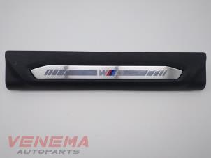 Gebruikte Sierlijst BMW 1 serie (F40) 118i 1.5 TwinPower 12V Prijs € 19,99 Margeregeling aangeboden door Venema Autoparts