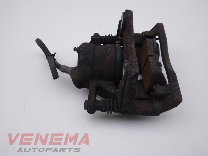 Remklauw (Tang) rechts-voor van een Renault Clio IV Estate/Grandtour (7R) 1.5 Energy dCi 90 FAP 2014