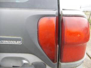 Gebruikte Achterklep reflector rechts Nissan Terrano II (R20/TR50) 2.7 TDi Prijs op aanvraag aangeboden door N Kossen Autorecycling BV