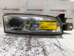 Gebruikte Koplamp rechts Mazda 626 (GE14/74/84) 1.8i LX,GLX 16V Prijs op aanvraag aangeboden door N Kossen Autorecycling BV