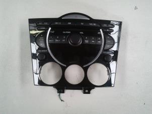 Gebruikte Radiobedienings paneel Mazda RX-8 (SE17) HP M6 Prijs op aanvraag aangeboden door N Kossen Autorecycling BV