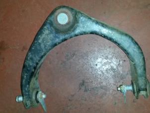 Gebruikte Draagarm Boven links-voor Dodge Ram 3500 Standard Cab (DR/DH/D1/DC/DM) 5.7 V8 Hemi 2500 4x2 Prijs op aanvraag aangeboden door N Kossen Autorecycling BV