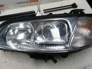 Gebruikte Koplamp links Opel Omega B (25/26/27) 3.0i V6 24V Prijs op aanvraag aangeboden door N Kossen Autorecycling BV