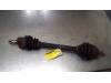 Aandrijfas links-voor van een Ford Focus 2, 2004 / 2012 1.4 16V, Hatchback, Benzine, 1.388cc, 59kW (80pk), FWD, ASDA; EURO4; ASDB, 2004-07 / 2012-09 2007