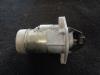 Startmotor van een Opel Astra J Sports Tourer (PD8/PE8/PF8) 1.7 CDTi 16V 2012